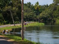 People clean and wash in the river